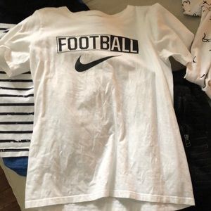 Boys size small Nike t shirt and black shorts
